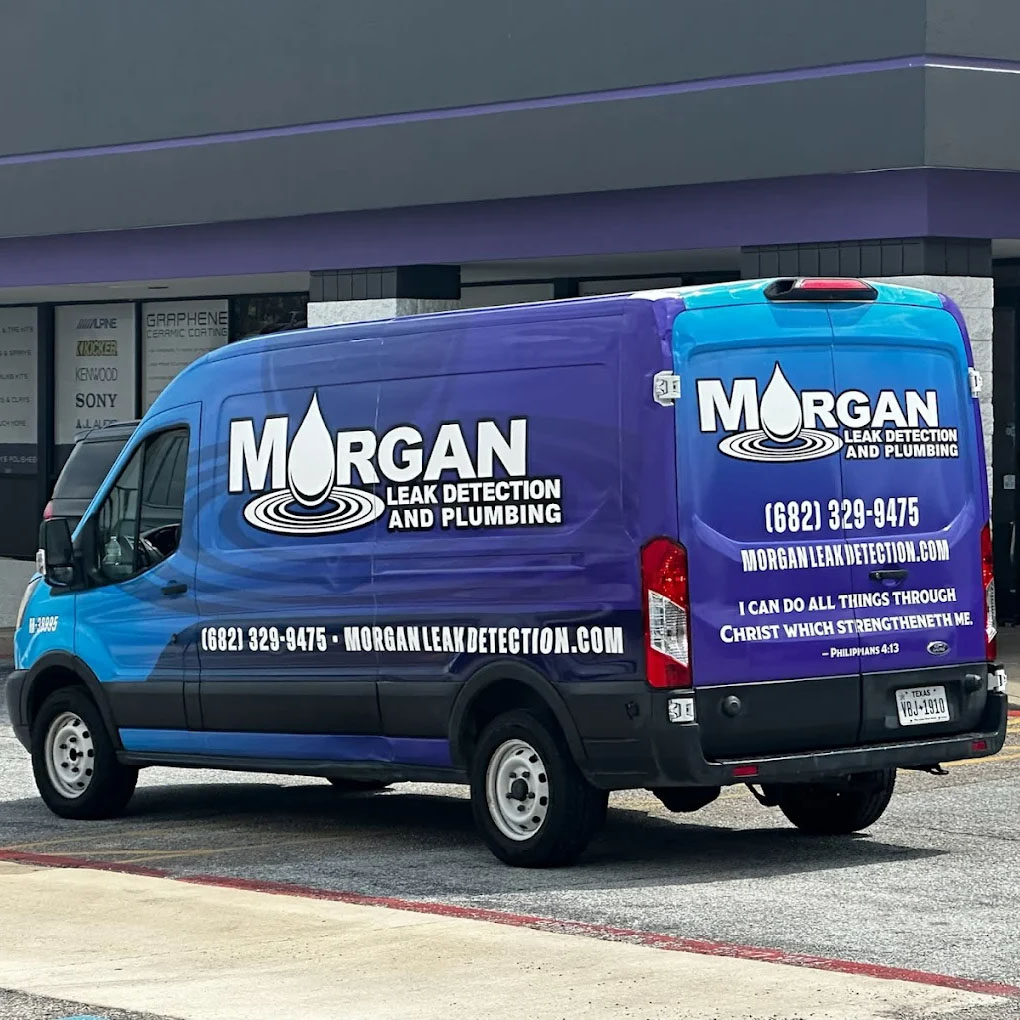 Morgan Leak Detection and Plumbing service van parked outside a commercial building in DFW.